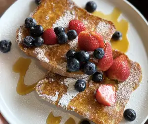 French toast with fresh berriers, VT maple syrup and powdered sugar at Schaefer's. 